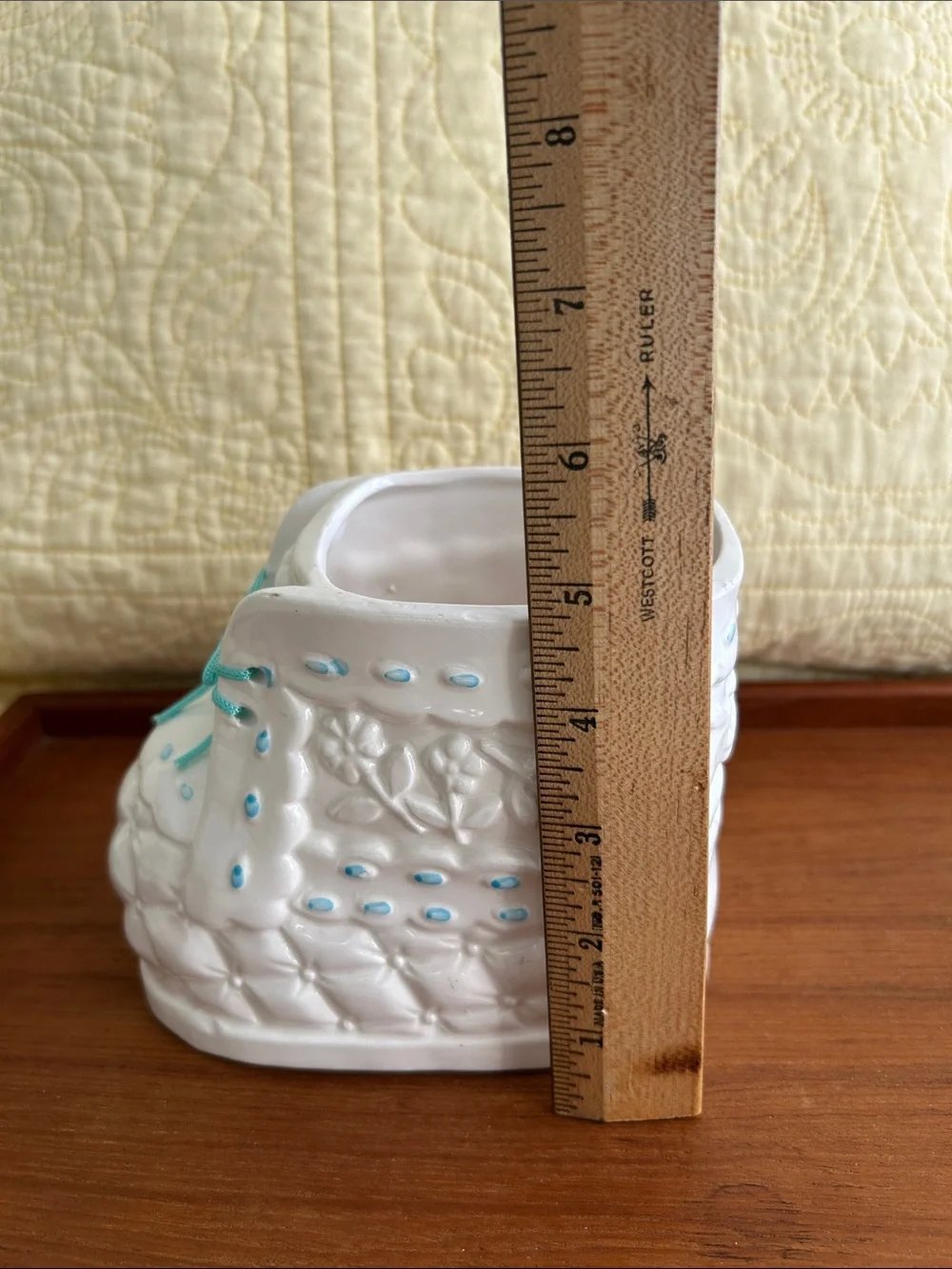 Vintage Ceramic baby bootie planter Embossed floral design and turquoise ribbon.